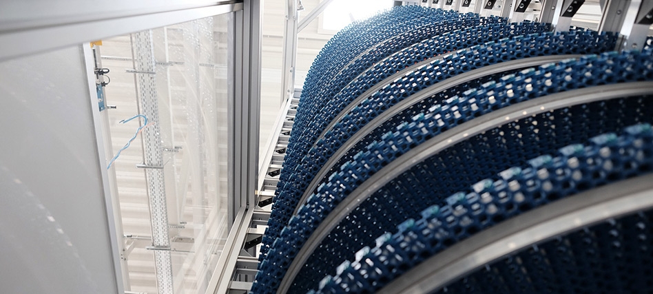 Spiral conveyor to optimize material flow